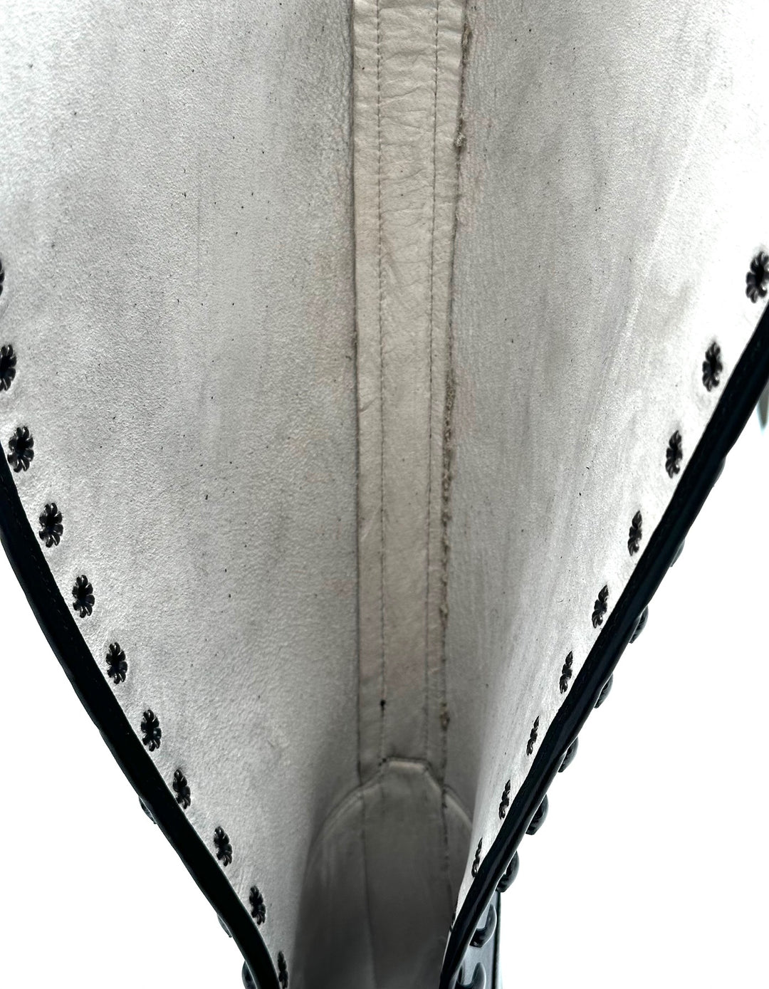 Repair rear strap/whalebone comes inside through per riding boot